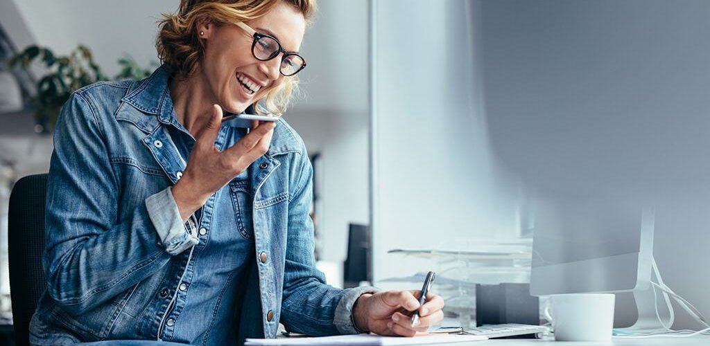 Image of woman talking on phone and asking questions about incorporating her business