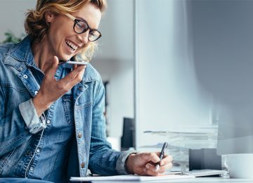 Image of woman talking on phone and asking questions about incorporating her business