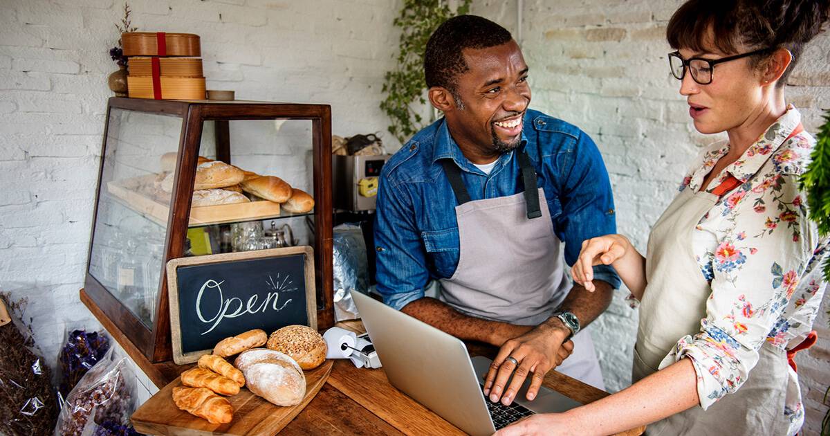 Image of two business owners in bakery who are starting a business