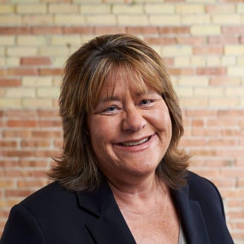 Image of Ann Plummer in Beene Garter office