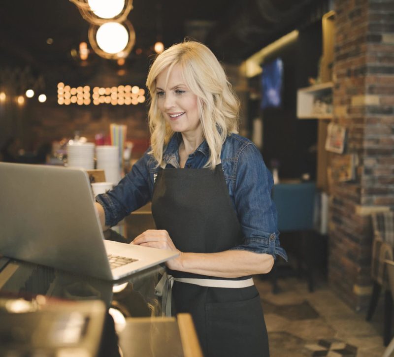 Coffee shop owner joining demo of Sage Intacct software