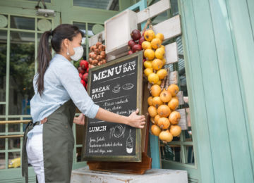 Business owner opening store