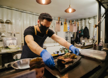 Business owner reopening a restaurant after receiving a Restaurant Revitalization Fund grant