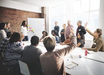 Image of nonprofit board of directors meeting and discussing internal control practices